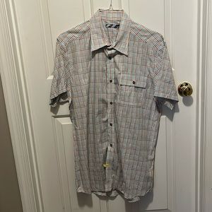 Modern Amusement short sleeve multi color striped shirt with pocket.